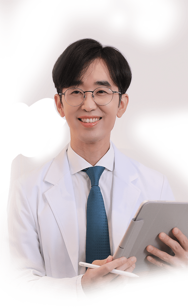 Doctor smiling, holding tablet. 345 Plastic Surgery where natural results are key.